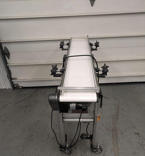 Used Dorner 8" wide x 48" long conveyor, variable speed drive. adjustable legs