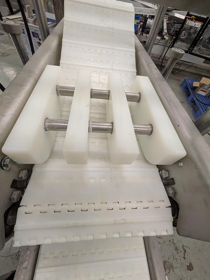 Used Friesens flattening conveyor, stainless