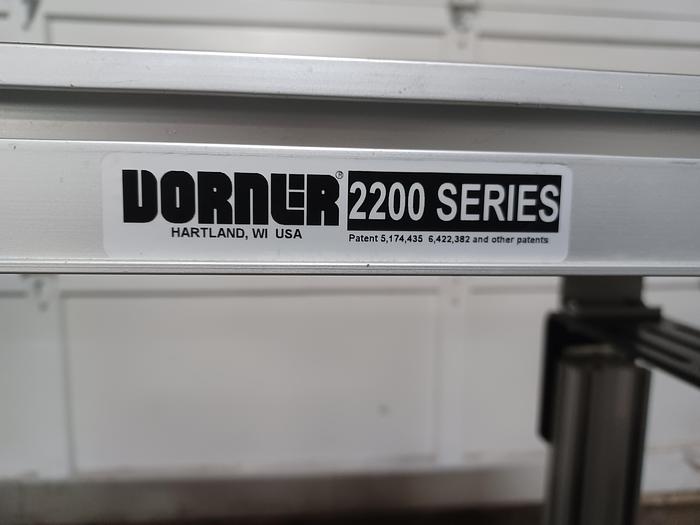 Used Dorner 2200 12" wide 4' long 34" tall PVC belt aluminum frame adjustable legs for height and angle. 277/480 3 phase