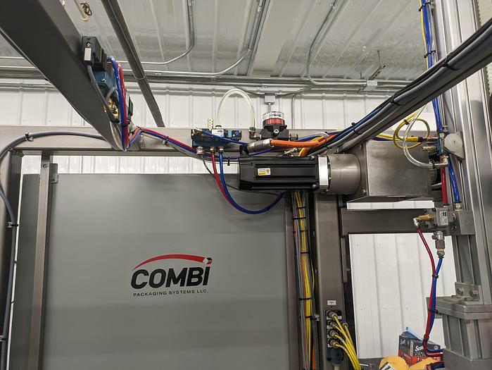 Used Combi Alphapack Case Packer and sealer (Never used) New 2019