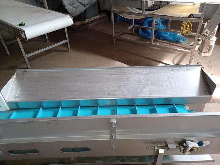 Used Stainless incline conveyor 11' long 12" wide discharge end 6' tall indeed 30" tall 