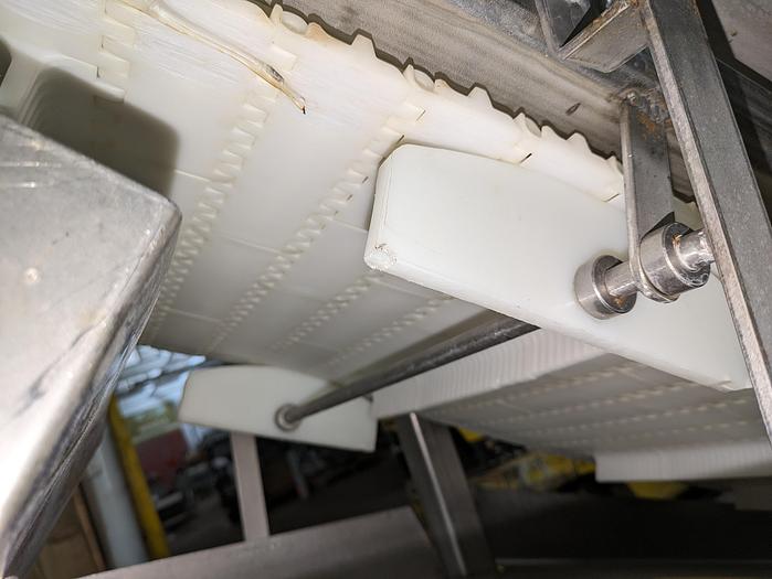 Used elevator, stainless steel frame, 17" wide, 11' long, plastic modular belt, adjustable legs, casters.