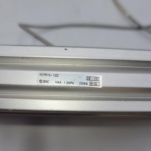 Used SMC MGPM16-100Z guided cylinder & 2 d-m9p (Four prong connector)