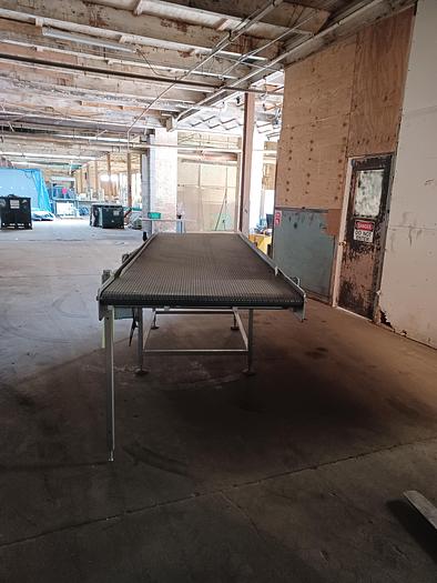 Used 10' long 36 1/2" wide 43" tall  conveyor all stainless frame and washdown motor