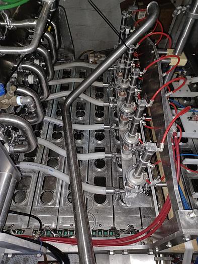 Used RA JONES Autoprod CF-840 Inline indexing filler, sealer and/or overcapper