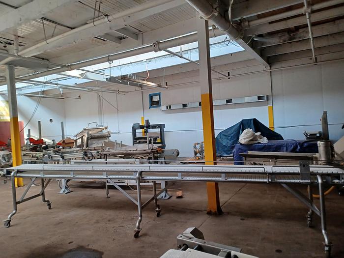 Used Stainless Steel plastic belt conveyor 18' long 36" wide 38" tall on wheels
