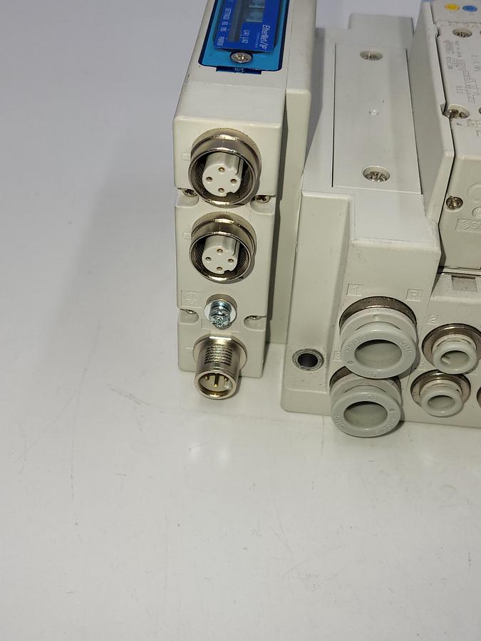 Used SMC HHB-144156 W/ 7 solenoids SY5300 & Two SY5400 air regulated / One: EX260-SIL1 Serial Transmission System output