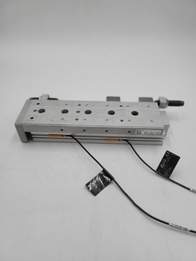 Used SMC MXS16-100 Pneumatic slide table - stroke 100mm