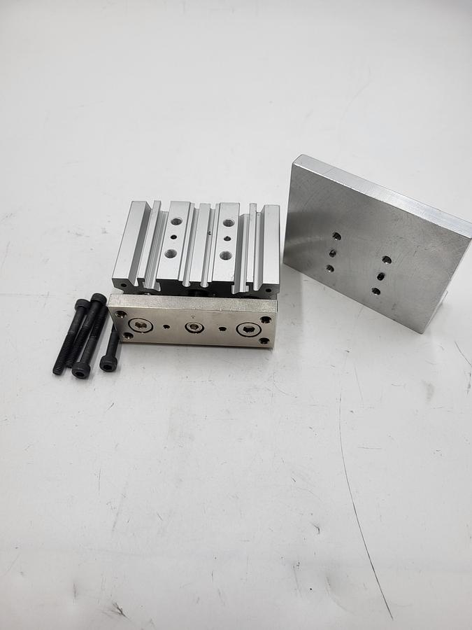 Used SMC MGPM20TN-20Z Guided Cylinder & screw down aluminum MOUNTING PLATE