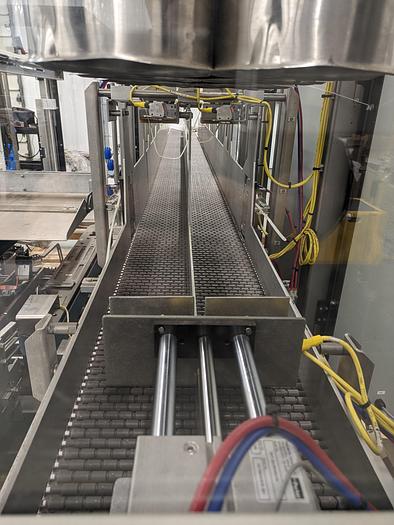 Used Combi Alphapack Case Packer and sealer (Never used) New 2019