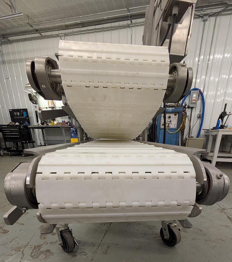 Used Friesens flattening conveyor, stainless