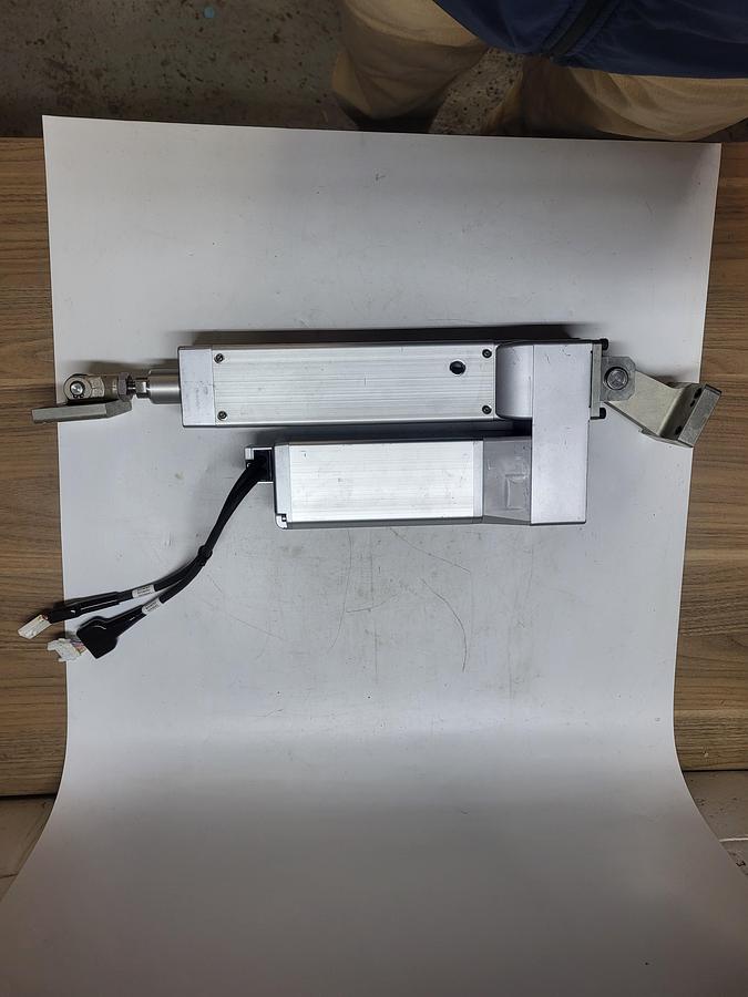 Used IAI RCS4-RRA7R-WA-200-8-120-T4-R10-B-CJT-ML electric radial cylinder with mounting plates
