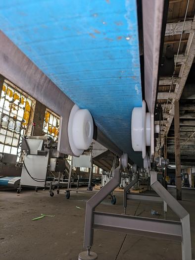 Used conveyor, stainless steel frame, 6" wide 15' long intralox belt adjustable feet flip up rails