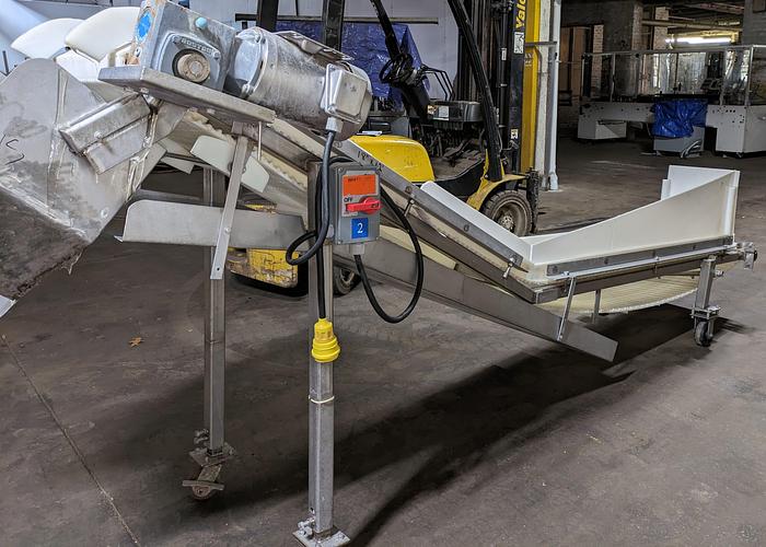 Used elevator, stainless steel frame, 17" wide, 11' long, plastic modular belt, adjustable legs, casters.