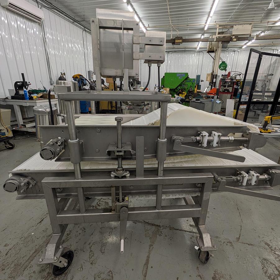 Used Friesens flattening conveyor, stainless