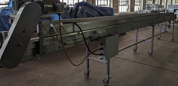 Used conveyor, stainless steel frame, 19" wide 20' long plastic modular belt adjustable leg with casters.