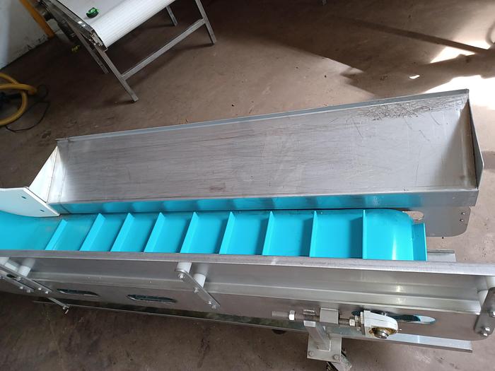 Used Stainless incline conveyor 11' long 12" wide discharge end 6' tall indeed 30" tall 