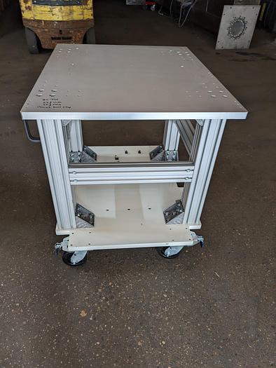 Used heavy duty rolling cart/work bench. casters