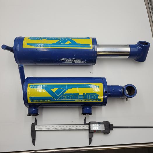 Used VERTI-LIFT HEAVY DUTY HYDRAULIC CYLINDER 4" STROKE 1" PIN - 6" CTR TO CTR between PORTS