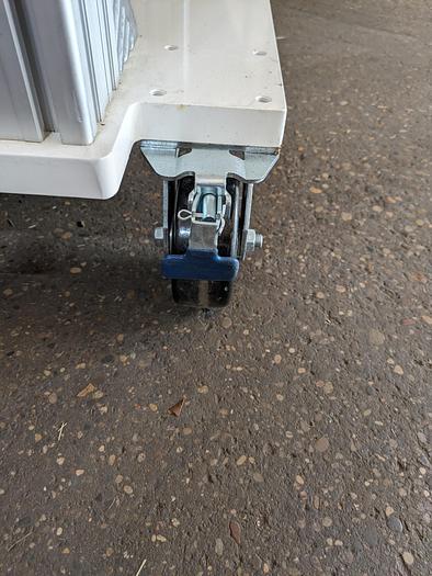 Used heavy duty rolling cart/work bench. casters