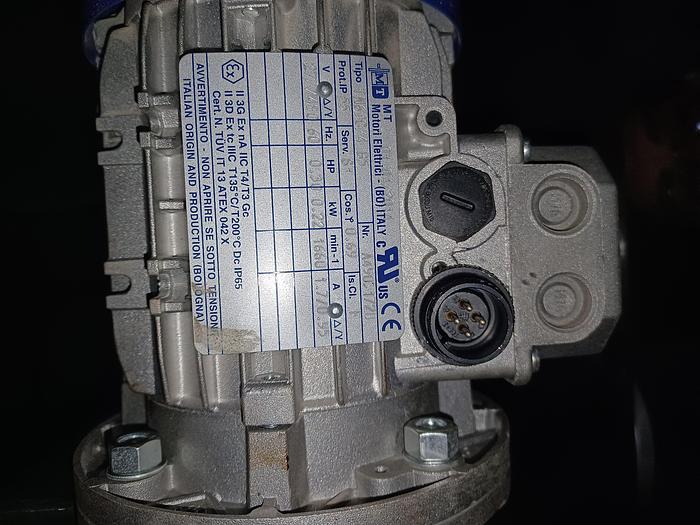 Used 8" wide 5' 10" long 34" tall stainless frame fabric top belt 3 phase 277/480 volt with adjustable feet and side rail.