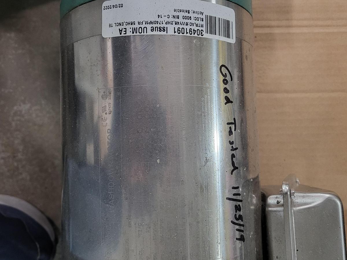 Used Dayton washdown stainless motor TEFC HP: 1.5 - 2 / model 6WY46 / 208 - 230 volts 56HC frame & pump attached