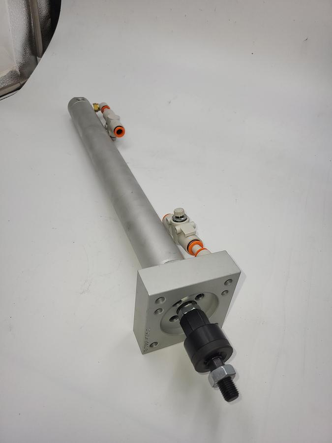 Used SMC NCDGBA32-1300 Round Body Cylinder: 1 1/4 in Bore, 16 in Stroke & floating joint SMC 3G1-44C / 3" mounting plate