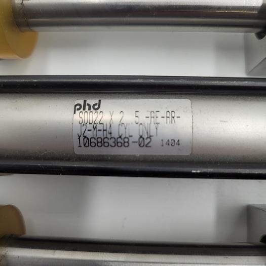 Used PHD SDD22 X 2 5-RER-PR-J2-M-H4 PNEUMATIC CYLINDER CONNECTED TO PHD FRAME SDD22X2 5-AE-PR-J2-M