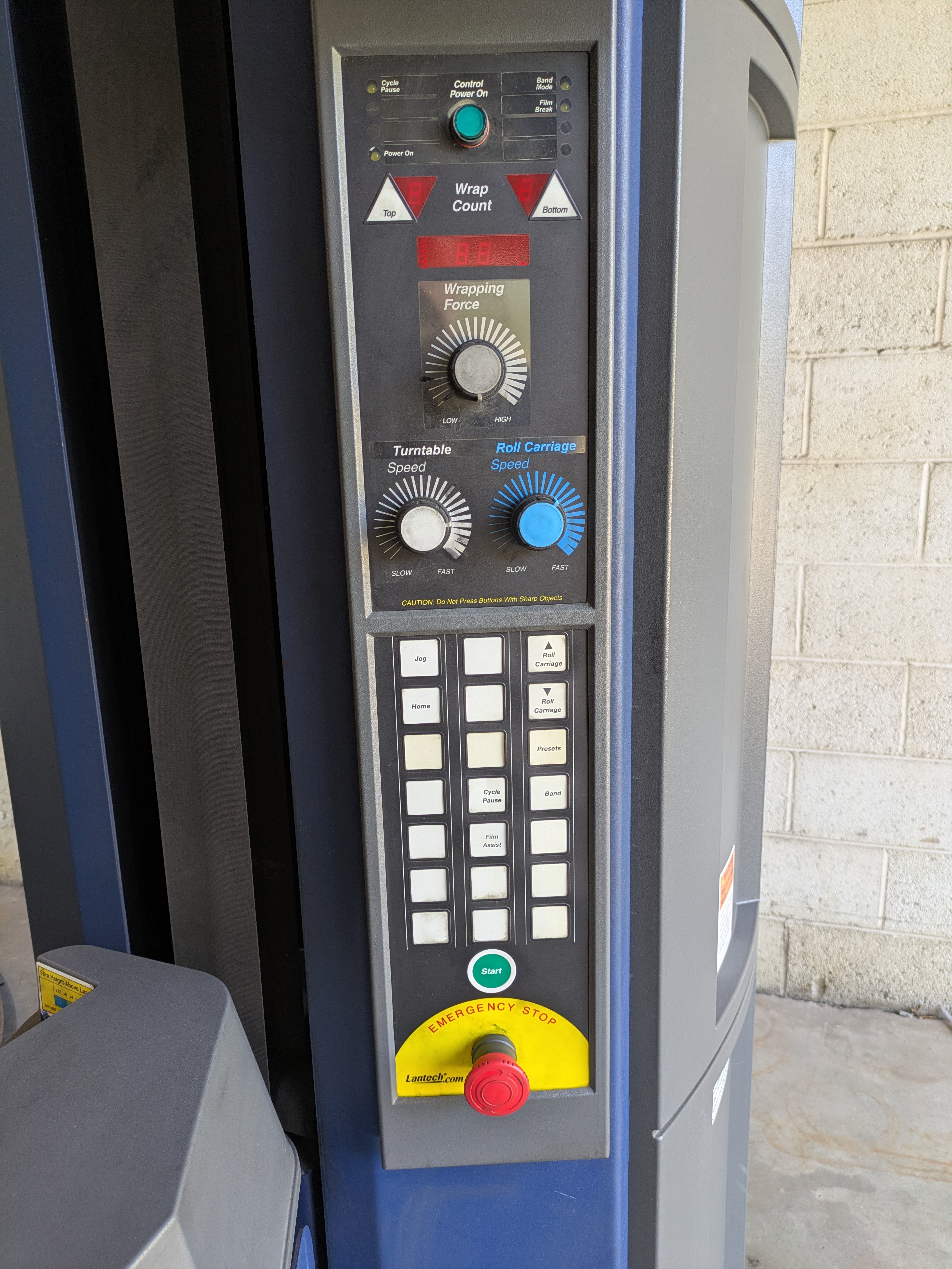Used Lantech Q300XT stretch wrapper with cut and clamp