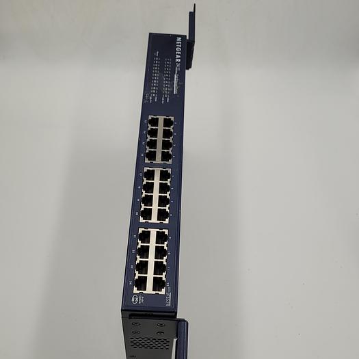 Used NETGEAR JFS524 — 24 Port 10/100 Fast Ethernet Unmanaged Switch with hanging bracket