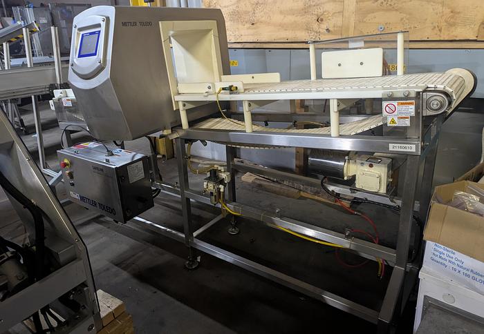 Used Safeline metal detector, 12 1/4" tall x 13 3/4" wide, Stainless conveyor, pne2013umatic reject