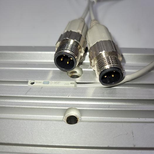 Used SMC MGPM16-100Z guided cylinder & 2 d-m9p (Four prong connector)