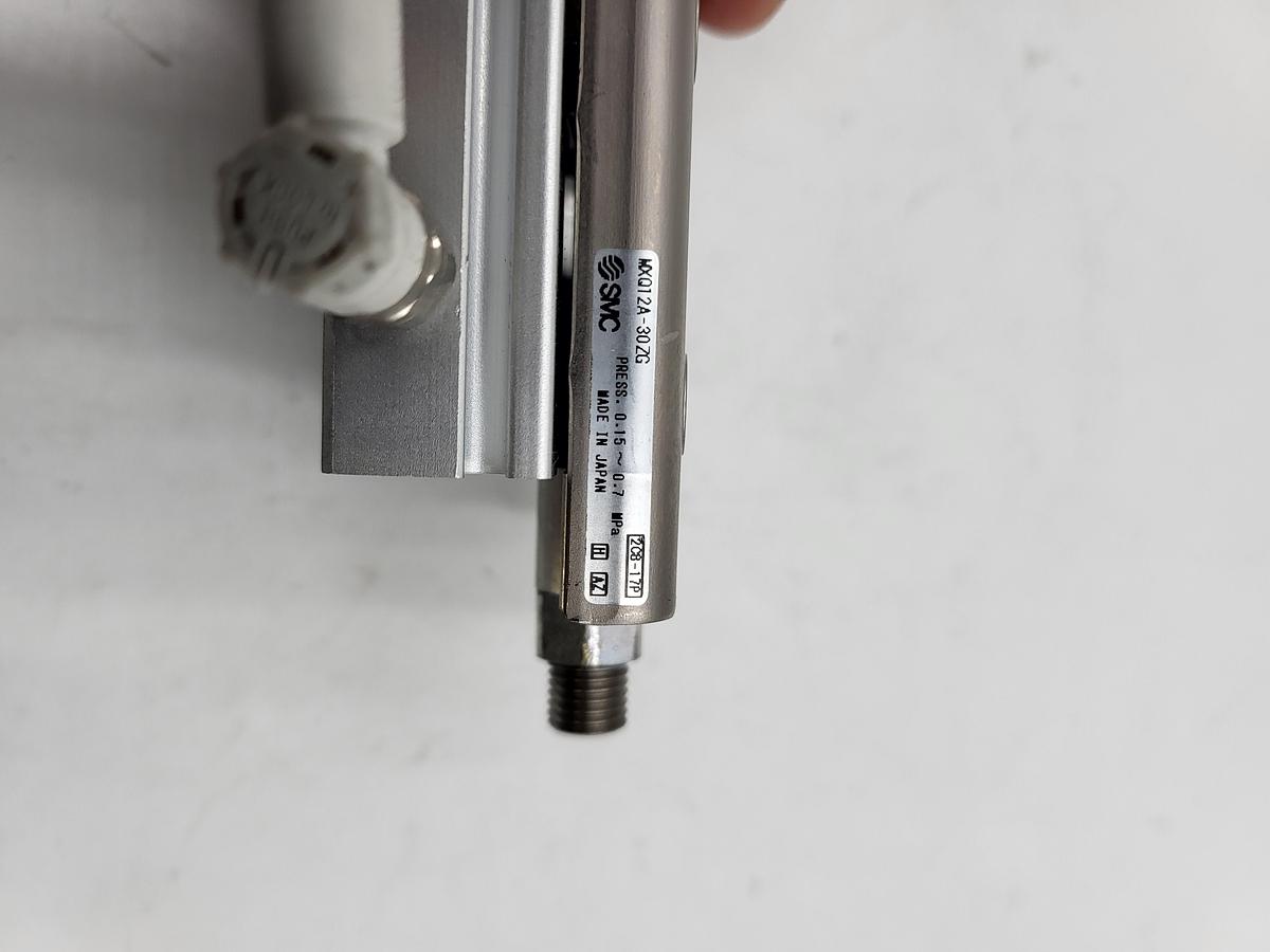 Used SMC MXQ12A-30ZG cylinder with slide table & two AS1201F valves