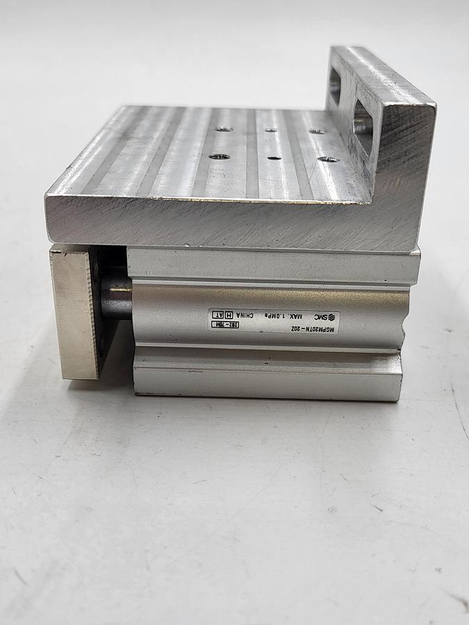 Used SMC MGPM20TN-20Z Guided Cylinder & screw down aluminum MOUNTING PLATE