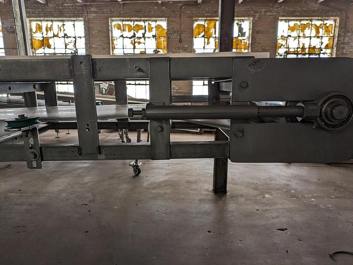Used stainless conveyor 18" wide 17'6" long, white pvc belting, adjustable legs, casters