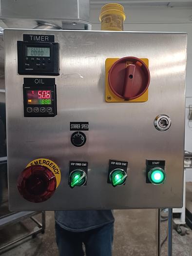 Used Citus jacketed mixing kettle and Alum-a-lift lifting cart