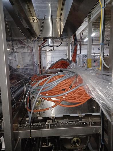 Used RA JONES Autoprod CF-840 Inline indexing filler, sealer and/or overcapper