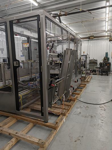Used Combi Alphapack Case Packer and sealer (Never used) New 2019