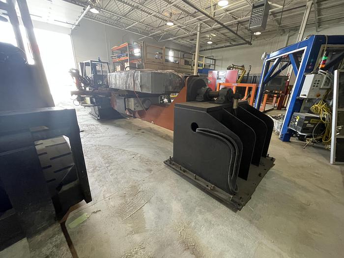 Used FANUC ARCMATE 120iC/10L MIG WELDING CELL WITH 2 AXIS 10' LONG DROP CENTER TRUNNION W/ROTARY CNC TABLE