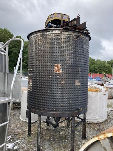 Used Used approximately 1500 gallon vertical stainless steel jacketed mix tank