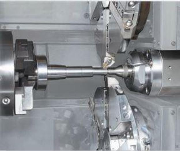 Used FUJI ANS-320TTS TWIN TURRET CNC LATHE WITH ROBOT LOAD/UNLOAD AND STOCKER TABLES