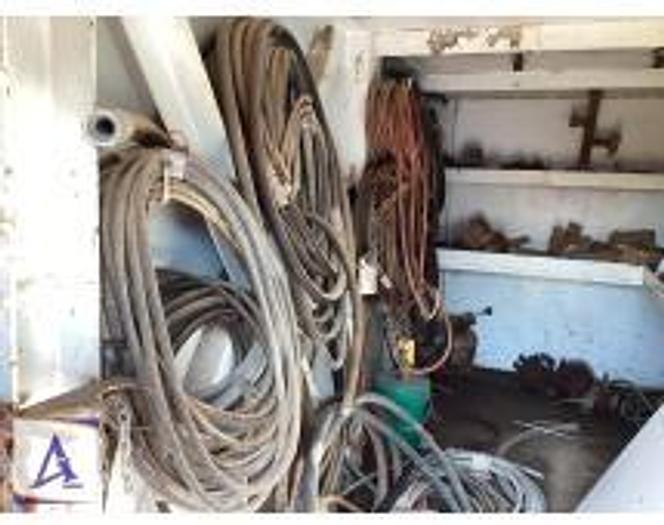 Used 7' x 25'9'' x 9' Pony Sub with built in shelving for parts!