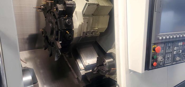 Used Okuma Genos L3000MYW-E, Rebel 80 Servo Bar Feed, 8" 3 Jaw Chuck, Live Tooling with Sub Spindle, OSP Genos L3000 MYW-E