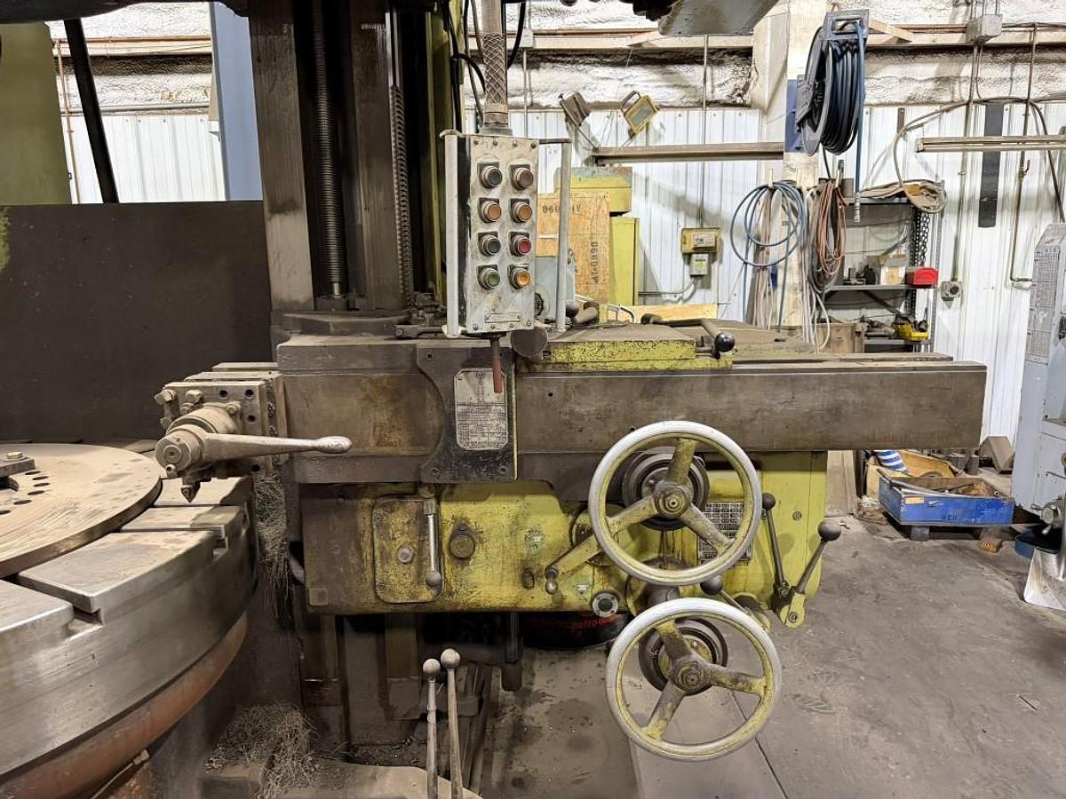 Used King Vertical Boring Mill, 62" Table, 72" Swing, 72" Under Rail. 40 HP 65 RPM, (1) Ram Heads, (1) Turret Head, (1) Side Head