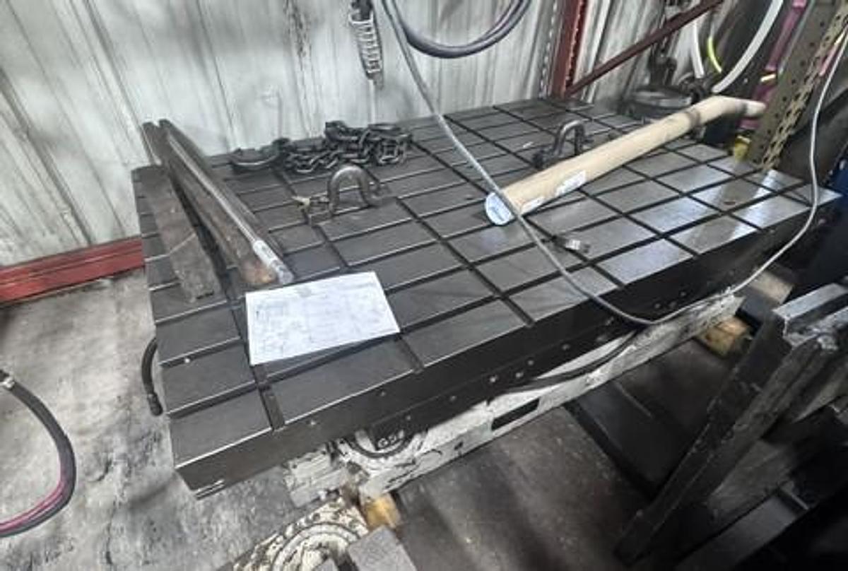 Used Giddings & Lewis 48" X 48" Airlift Rotary Table with a 48" X 72" "T" slotted riser plate