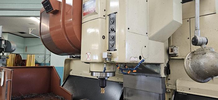 Used Okuma Howa Vertical Machining Center, Millac 65V, Table 29" X 94", X Travel 79", Y Travel 29", Z Travel 22", 6500 RPM, 15 HP, Fanuc 15 M CNC