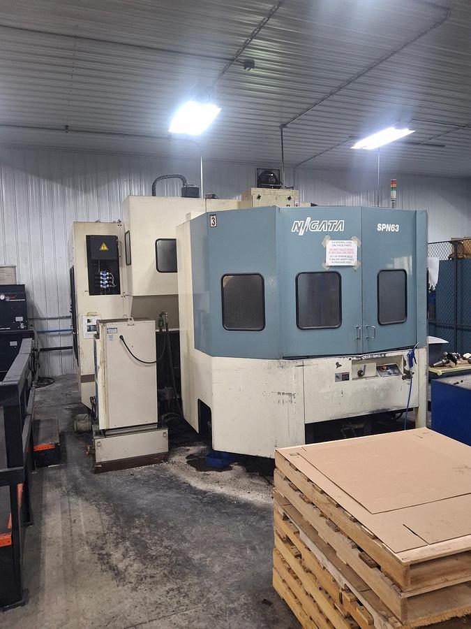 Used Nigata Model SPN 63, 24.5" X 24.5" Pallet, 39.4" X Travel, 34.5" Y Travel, 31.5" Z Travel, 30 HP, 12,000 PRM, Fanuc 16M