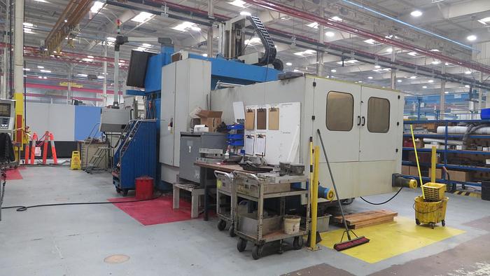 Used Vision Wide Double Column VMC, Model VF 4000, 81" X 165" Table, X Travel 165", Y Travel 90.5", Z Travel 36.2", Fanuc CNC