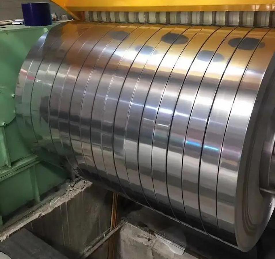 Used GUIDA+SPOTTI 1600x5mm Slitting Line (Tool Changer)