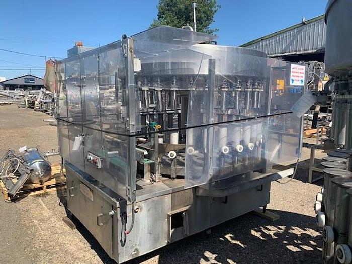 Used 1988 Cobert 32 Head Rotary Low Vacuum Filler Olimpia